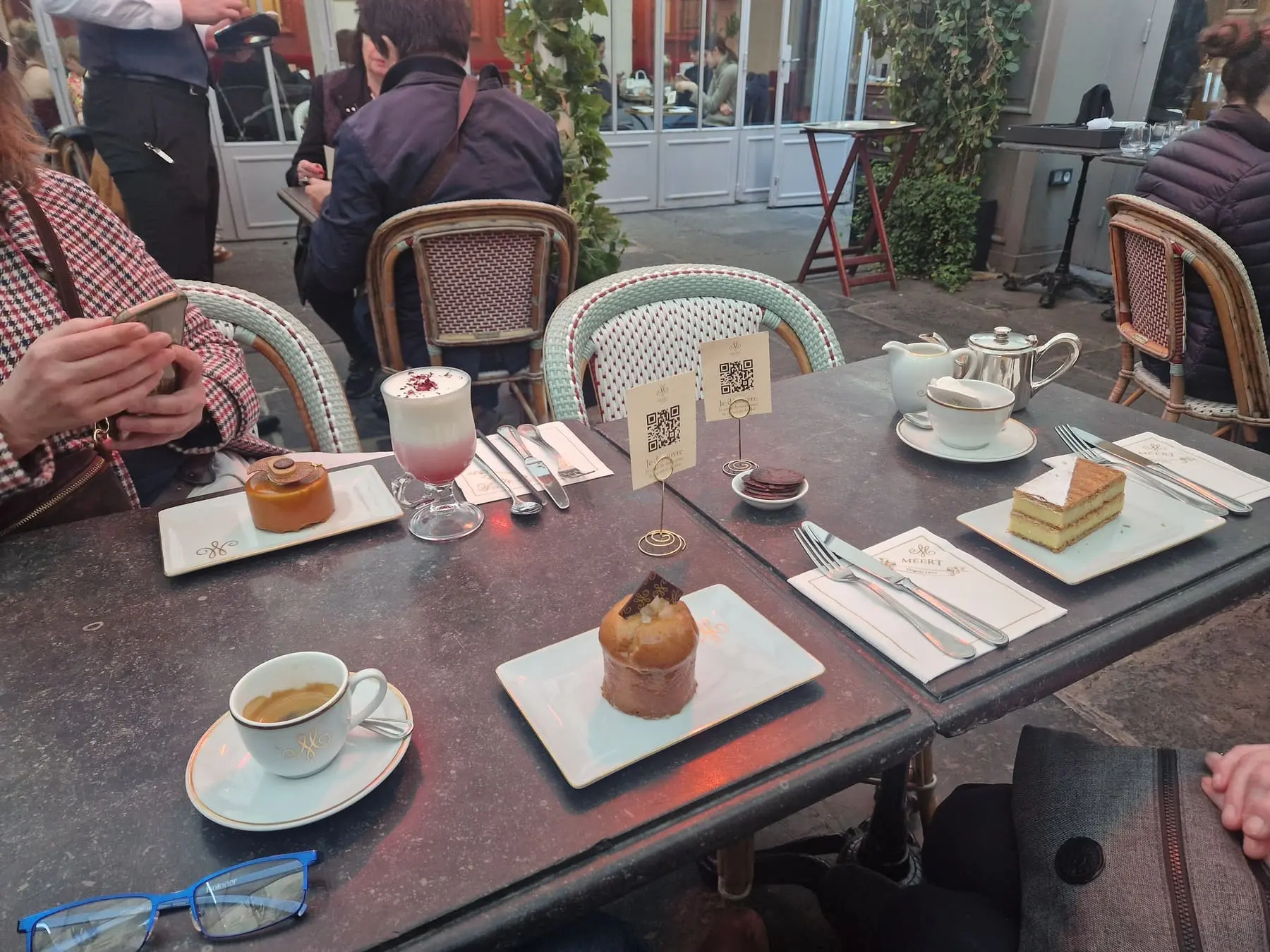 The tarrce in the backyard of Meert patissserie and its delicious cakes